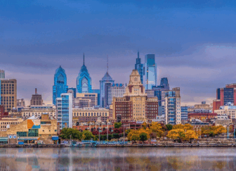 An image of the Schuylkill River and Philadelphia skyline.